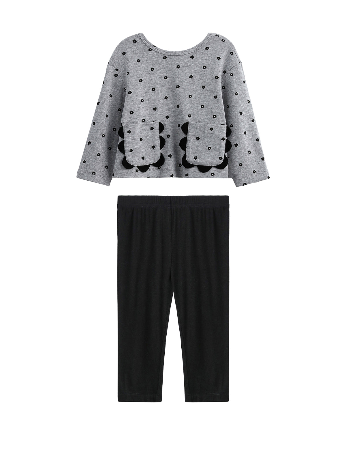 The Mabel + Honey Petal Pockets Two Piece Set features a long sleeve floral top with scalloped pockets and plain black pants, arranged flat on a white background.