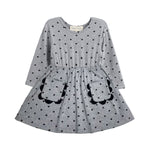 The Mabel and Honey Petal Pockets Long Sleeve Floral Scalloped Pocket A Line Dress features a gathered waist, two front pockets with scalloped trim, and a classic round neckline. Designed for children, this comfortable knit dress showcases a charming floral pattern.