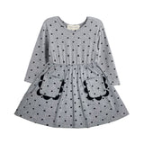 The Mabel and Honey Petal Pockets Long Sleeve Floral Scalloped Pocket A Line Dress features a gathered waist, two front pockets with scalloped trim, and a classic round neckline. Designed for children, this comfortable knit dress showcases a charming floral pattern.