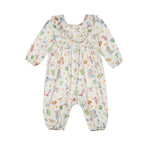 Dress your little one in the Mabel and Honey Cactus Kisses Romper, a long-sleeved bubble romper featuring a ruffle collar and charming western-inspired print with colorful cacti, flowers, animals, and playful objects on a crisp white background.