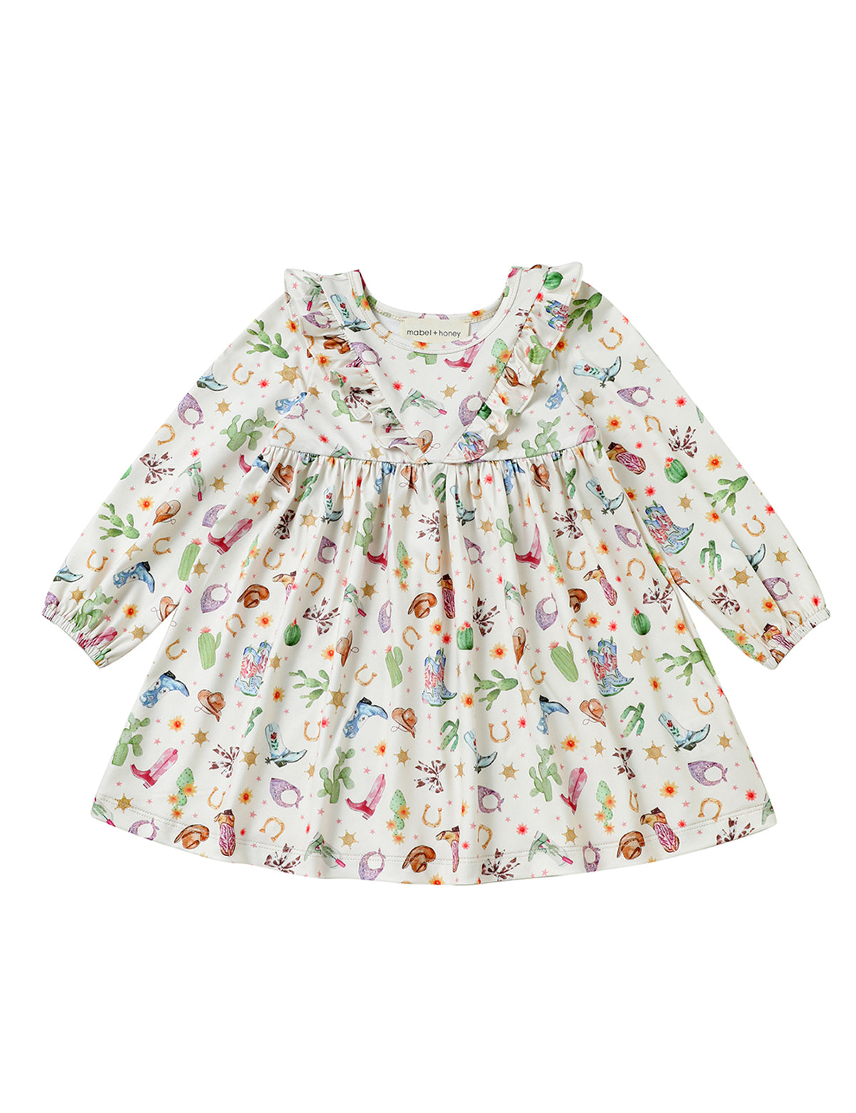 The Cactus Kisses Dress Long Sleeve Print Ruffle Trim A Line Dress by Mabel and Honey features a white long-sleeve design with a ruffled neckline and a playful western-themed print of cacti, cowboy boots, hats, horseshoes, and stars.