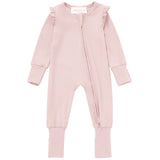 Dress your baby in the Whimsical Wildflower Long Sleeve Ruffle Trim Zip Front Convertible Romper by Mabel and Honey, featuring a light pink blush hue, long sleeves, delicate ruffle details on the shoulders, and a convenient two-way diagonal zipper from neck to left leg. Its ribbed knit fabric provides a soft and cozy feel.