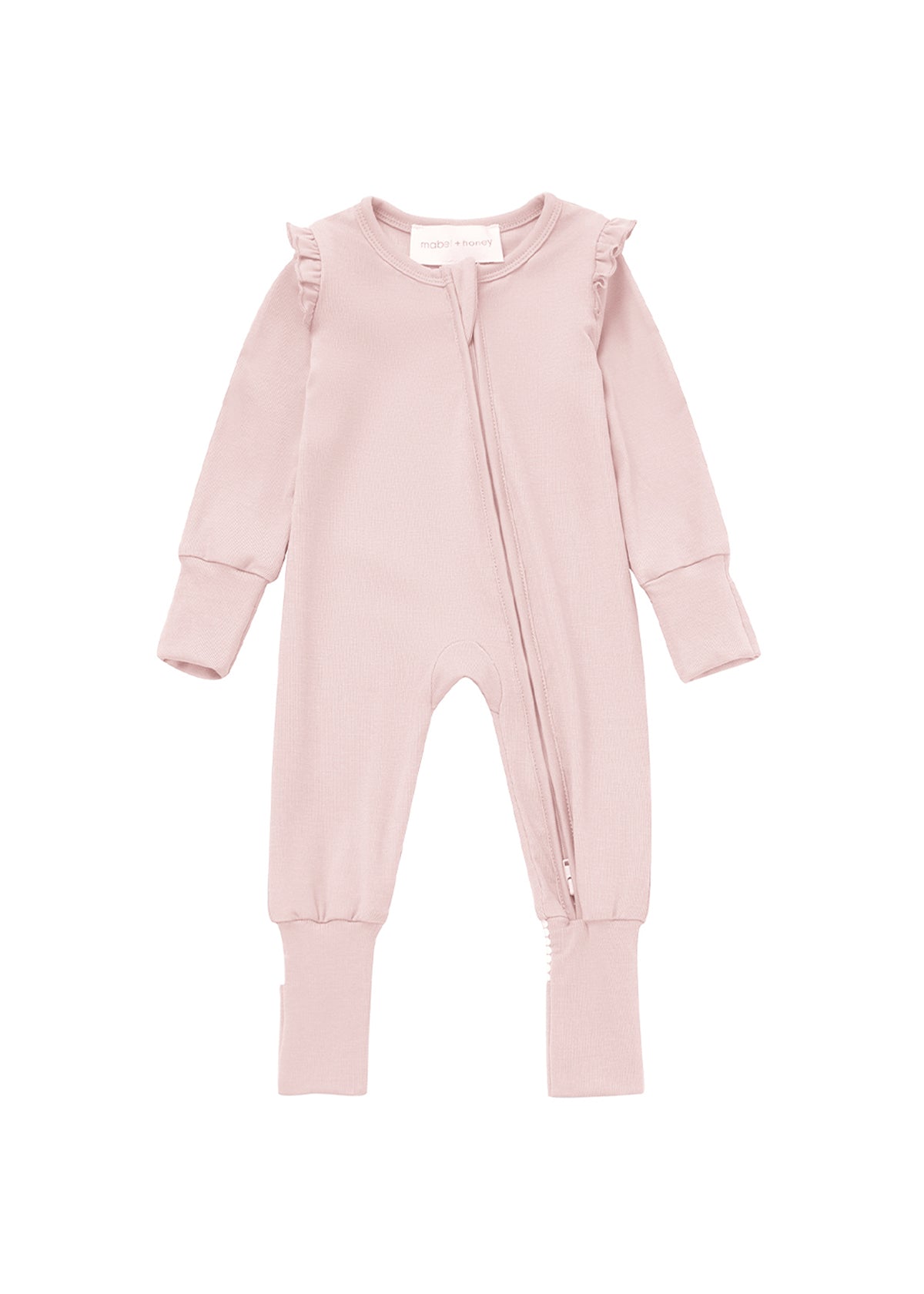 Dress your baby in the Whimsical Wildflower Long Sleeve Ruffle Trim Zip Front Convertible Romper by Mabel and Honey, featuring a light pink blush hue, long sleeves, delicate ruffle details on the shoulders, and a convenient two-way diagonal zipper from neck to left leg. Its ribbed knit fabric provides a soft and cozy feel.