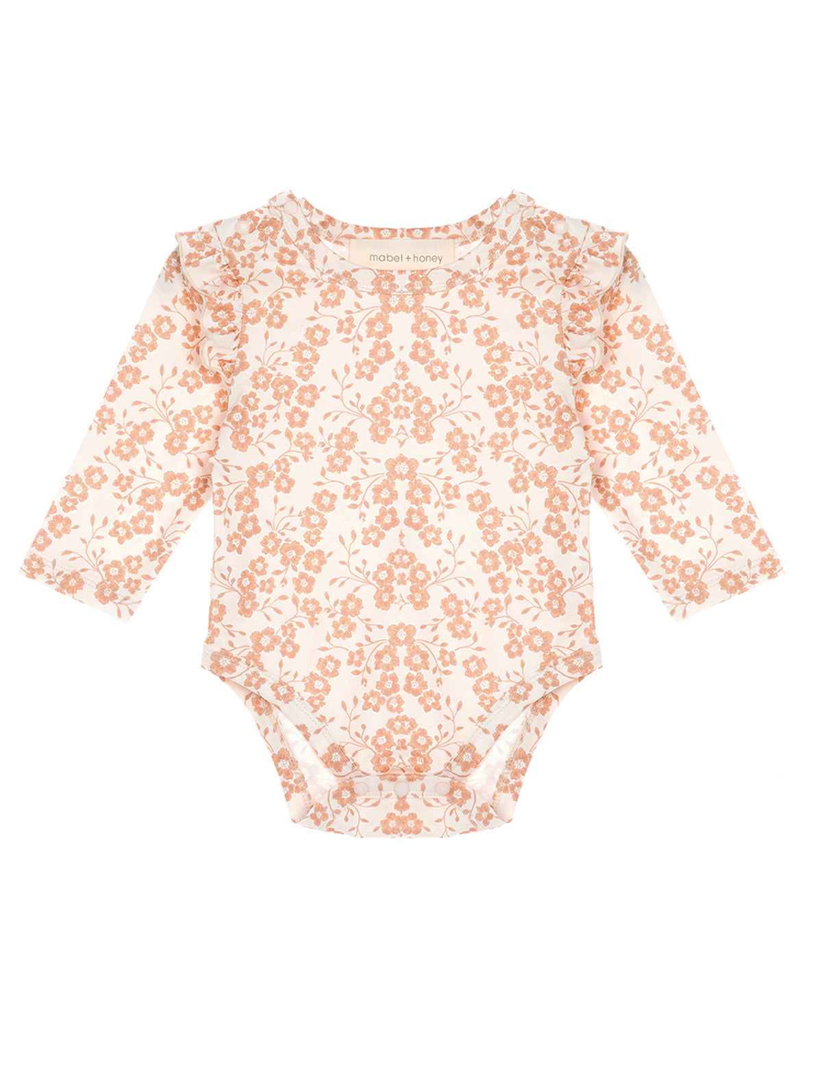 The Mabel and Honey Honey Petals Bodysuit Long Sleeve Floral Print Ruffle Shoulder Bodysuit features a charming peach floral pattern on a white background, with delicate ruffled shoulder details.