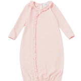 The Mabel + Honey Amelia Rose Newborn Gown features long sleeves and a soft Tencel knit in light pink, designed with ruffle trim along the diagonal front seam and gentle elastic at the hem for comfort.