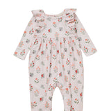 The Amelia Rose Long Sleeve Floral Ruffle Shoulder Bubble Romper by Mabel and Honey features charming ruffled shoulders, a sweet bubble silhouette, and a delicate pink, red, and green floral pattern on a soft light pink background. Made from a cozy cotton blend to keep your little one comfortable all day.