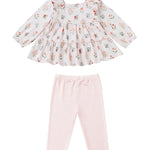 Showcase your little one in the Amelia Rose Two Piece Set from Mabel and Honey, featuring a long-sleeve, floral tiered top in white and pastel hues with delicate ruffles, paired perfectly with light pink leggings. This adorable set is displayed flat against a white background, highlighting its charming and stylish design.