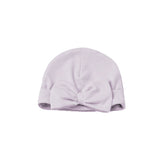 The Mabel and Honey Soft Meadow Solid Knotted Bow Ribbed Trim Hat for baby girls features a light lilac color with a large knotted bow on the front, shown against a white background.