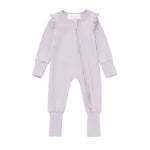 Discover cozy sleepwear with the Mabel + Honey Soft Meadow Convertible Romper: a lavender baby onesie made from soft Tencel knit, designed with long sleeves, front zipper, ruffled shoulders, and ribbed cuffs at the sleeves and ankles. This solid straight leg essential effortlessly transitions from sleepwear to a convertible romper for baby girls.