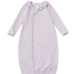 The Soft Meadow Newborn Gowns Long Sleeve Solid Ruffle Trim Gown by Mabel + Honey features a lovely lilac color, long sleeves, and a charming ruffled trim that runs diagonally from the neckline—making it a perfect coming home outfit for your newborn. Its gathered elastic bottom keeps your baby cozy and comfortable.