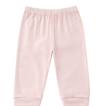 Mabel and Honey Whimsical Wildflower Joggers in blush pink, featuring a ribbed elastic waistband and cuffed ankles, are laid flat on a white background.