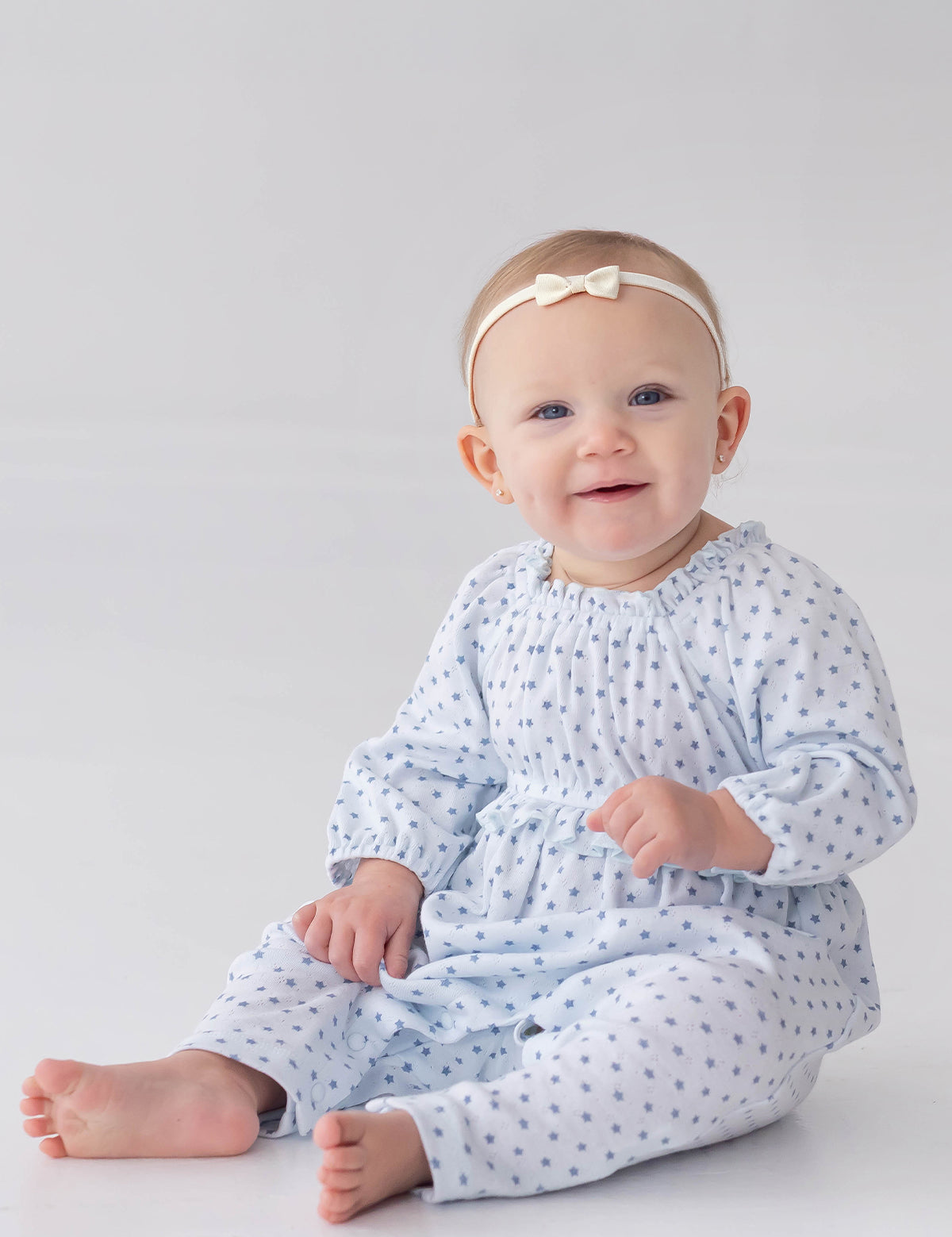 Luna Bella Long Sleeve Star Print Ruffle Trim Romper