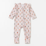 The Amelia Rose Convertible Romper by Mabel + Honey is a long-sleeve, straight leg romper featuring a pink floral pattern with soft pink stripes, ruffled shoulders, and a convenient front zipper, shown flat against a white background.