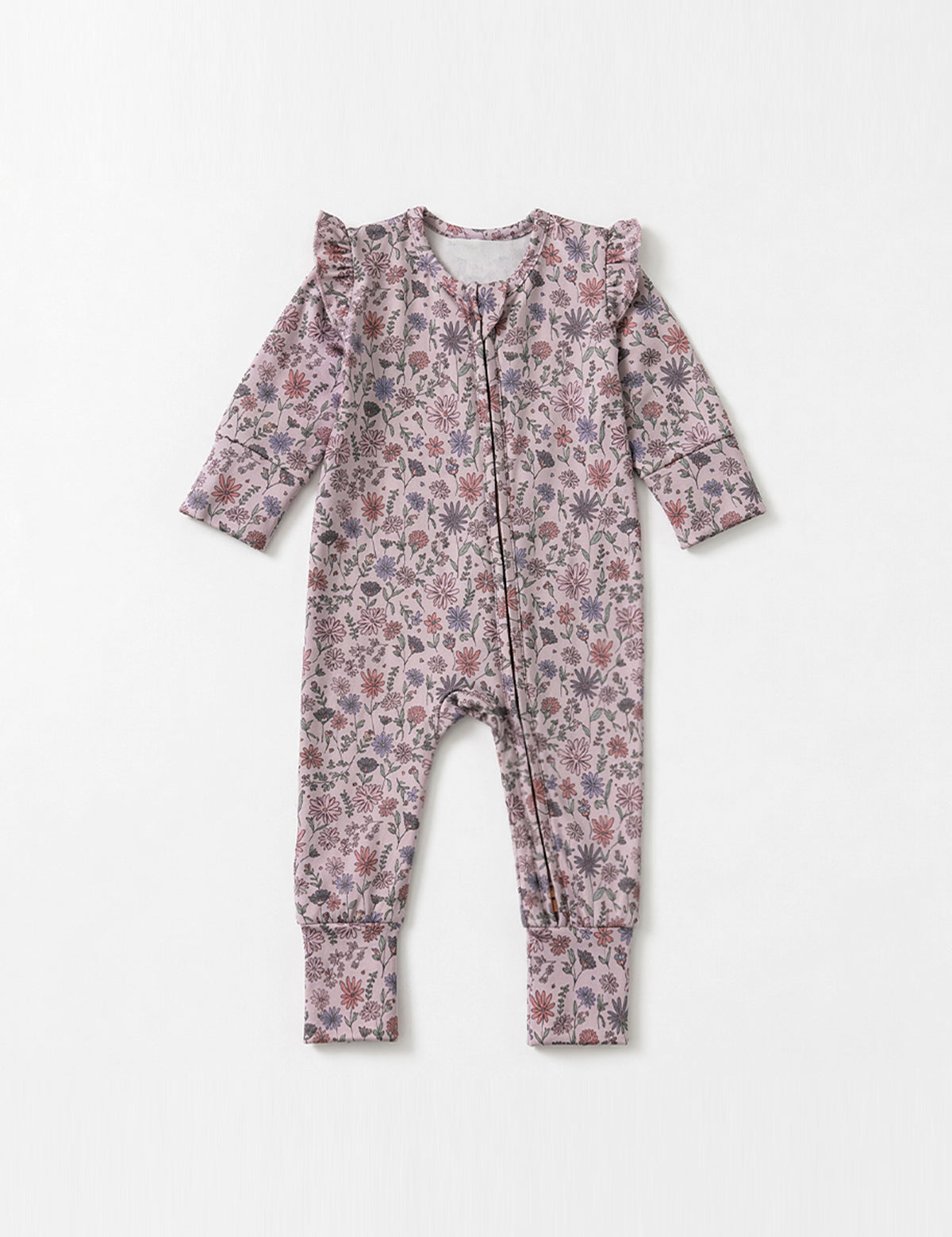 The Mabel + Honey Soft Meadow Long Sleeve Floral Ruffle Shoulder Convertible Romper is a footless baby romper made from soft stretch knit in muted floral prints, featuring ruffled shoulders and a front zipper, displayed laid flat on a white background.