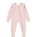 Introducing the Whimsical Wildflower Convertible Romper with Headband from Mabel + Honey—a soft light pink baby romper featuring long sleeves, ruffled shoulders, a diagonal zipper, and a convertible footed sleeper design for versatility and comfort. The set includes a matching pink fabric headband adorned with a bow displayed above the outfit.