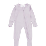 The Mabel + Honey Soft Meadow Convertible Romper features soft tencel knit in a light purple long-sleeve design with ruffle shoulders and a convenient front zipper. This solid convertible romper comes paired with a matching headband topped with a sweet bow, creating an adorable, coordinated look for your baby girl.