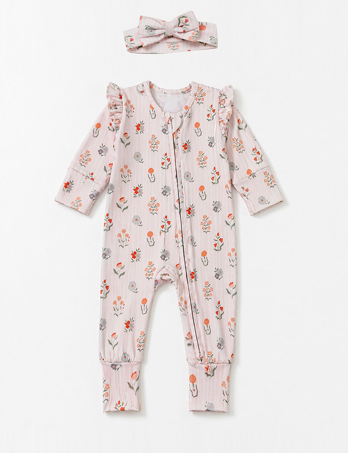 The Amelia Rose Convertible Romper by Mabel + Honey features a charming long sleeve floral print design with ruffled shoulders and comes with a matching headband, shown here laid flat on a white background.